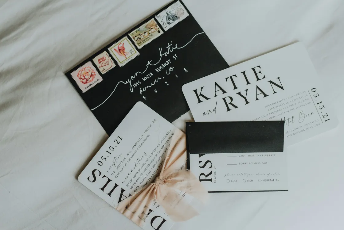 Wedding stationery set, black and white theme, lots of stamps on the envelope