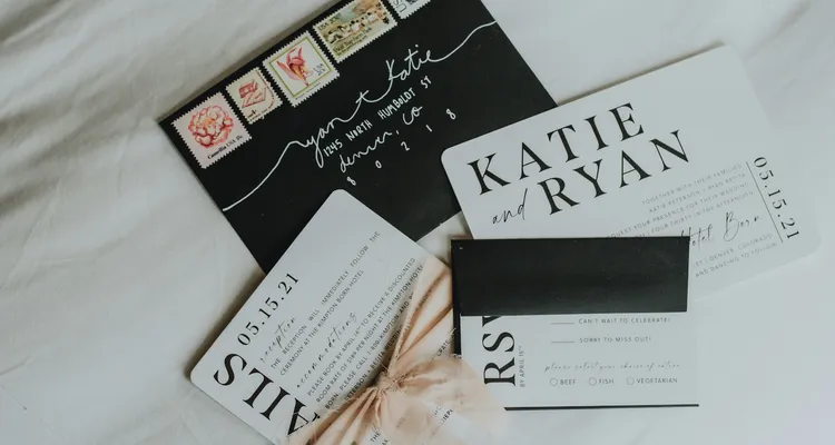 Wedding stationery set, black and white theme, lots of stamps on the envelope